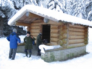 The log building at its site in Balnain Wood