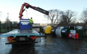 Lorry placing bins at Kirkhill Community centre