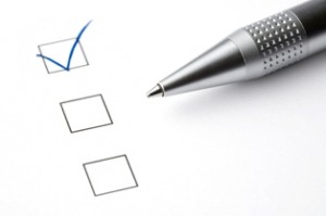 tick boxes and pen